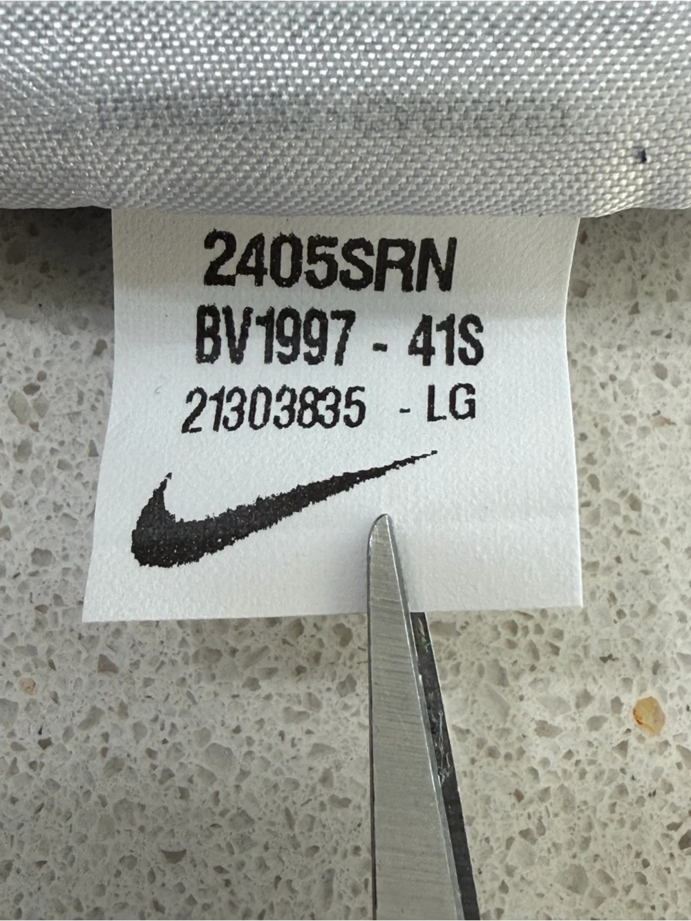 Nike Navy Short-Sleeve Tee with White Swoosh.